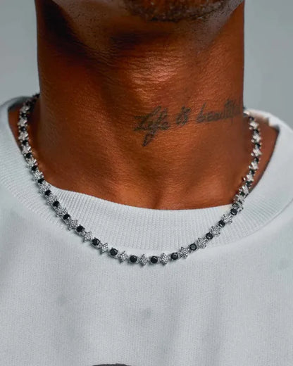Collier tennis MAWIYA hip-hop premium 6MM, finition argentée/or blanc, serti de zircones scintillantes style diamant. Design étoile moderne avec pierres brillantes, look iced-out