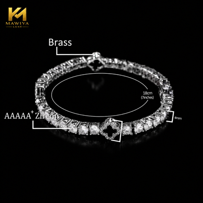Bracelet MAWIYA tennis raffiné en finition plaquée or ou argentée, serti de zircones CZ AAAA+ scintillantes et sublimé par de délicats motifs trèfle à quatre feuilles.